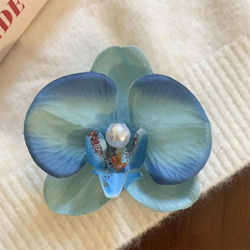 Pinza / horquilla para el cabello con flor de orquídea