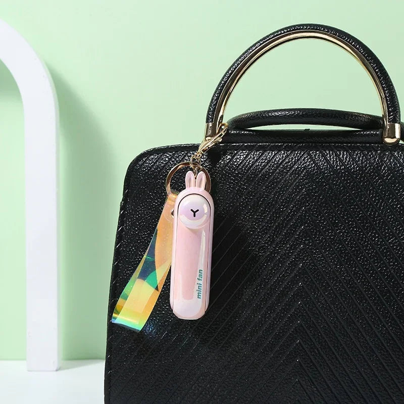 Mini Ventilador con Linterna Portátil | Carga USB| Colgante