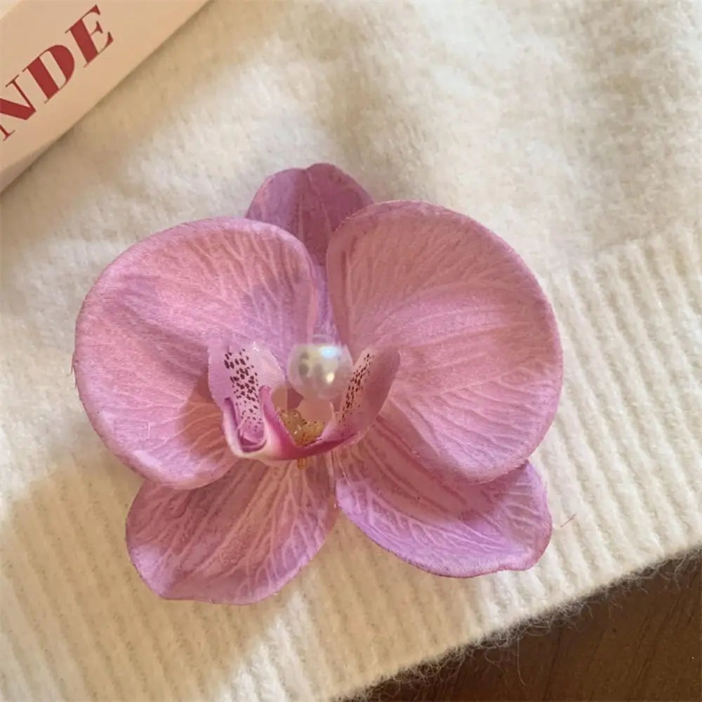 Pinza / horquilla para el cabello con flor de orquídea