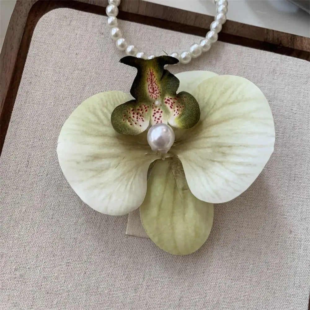 Pinza / horquilla para el cabello con flor de orquídea