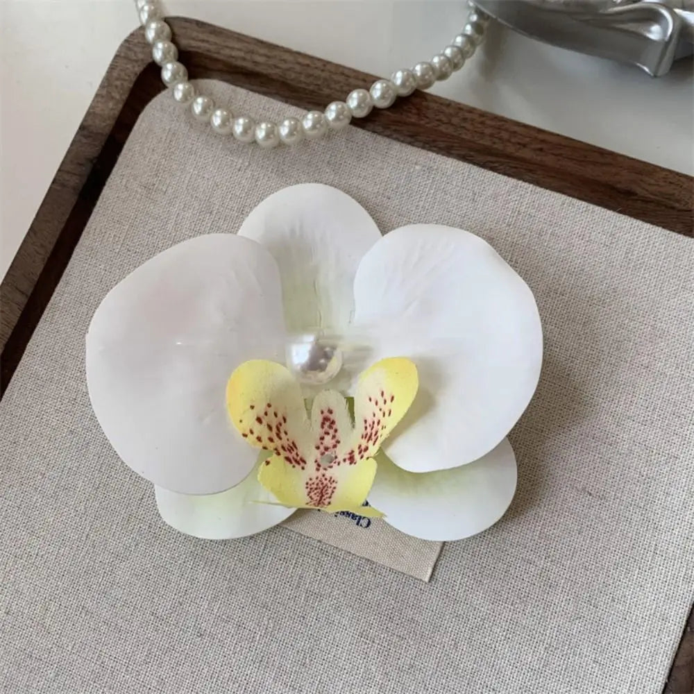 Pinza / horquilla para el cabello con flor de orquídea