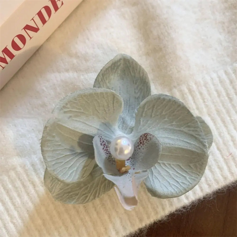 Pinza / horquilla para el cabello con flor de orquídea