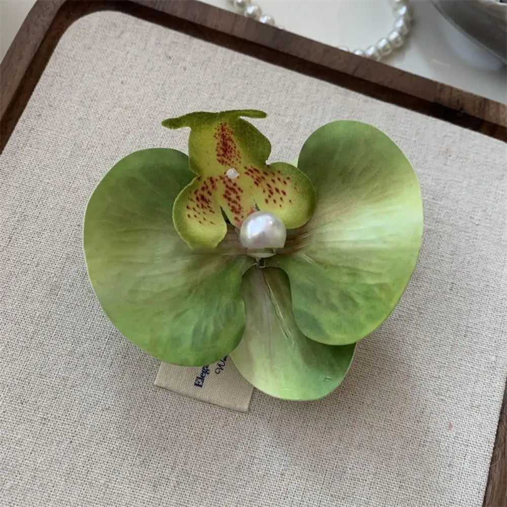 Pinza / horquilla para el cabello con flor de orquídea