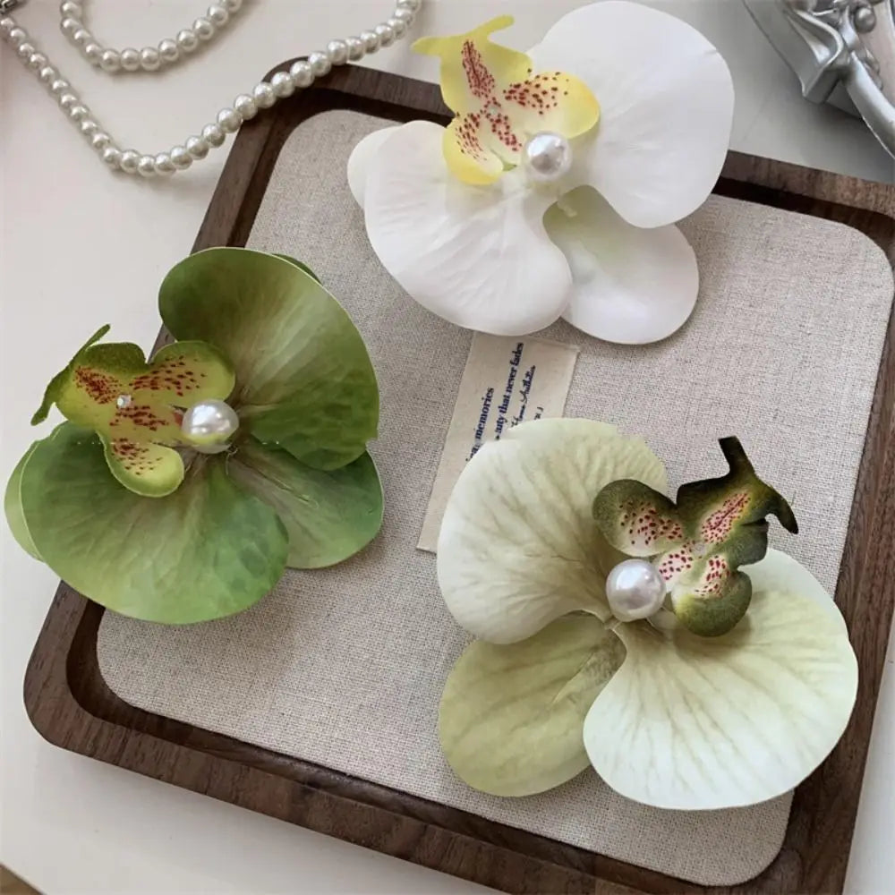 Pinza / horquilla para el cabello con flor de orquídea